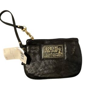 Coach Poppy Wristlet with the iconic black liquid gloss leather. NWT